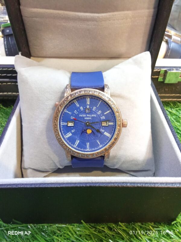 Patek Philippe Geneva Blue Dial Women’s Watch with Ornate Gold-Tone Case & Blue Strap